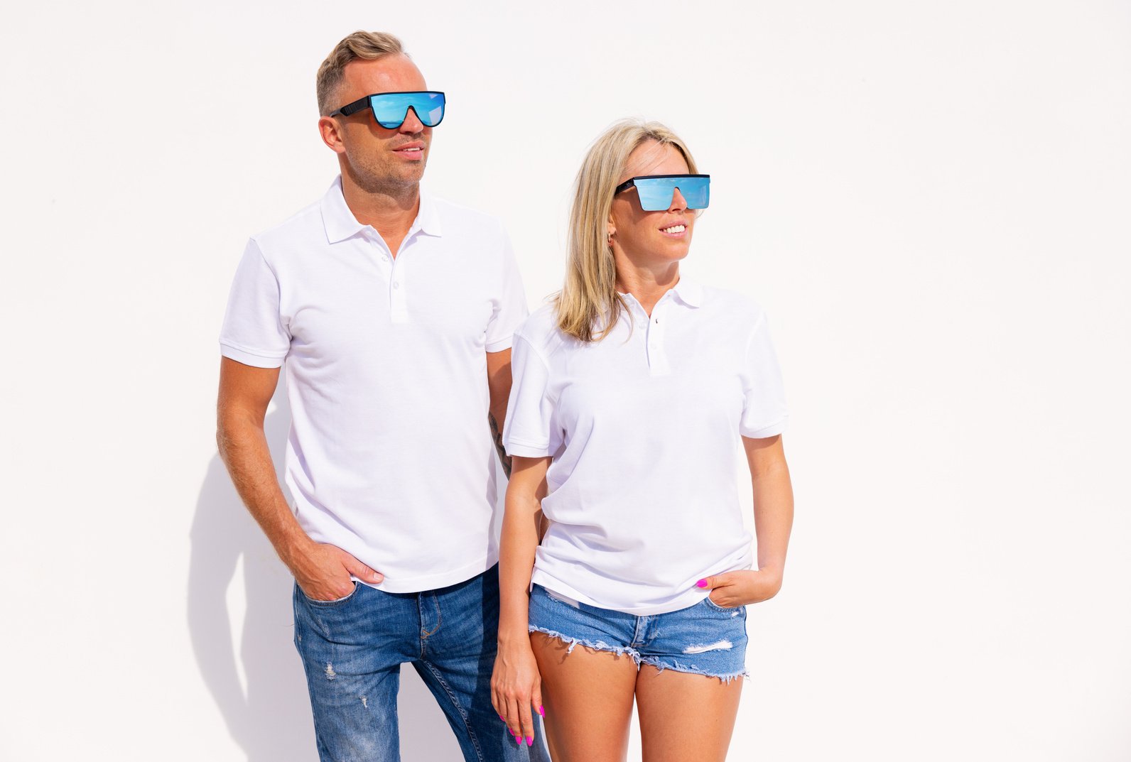 Woman and Man Wearing Blank White Polo Shirts, Mockup for Polo Shirt Design